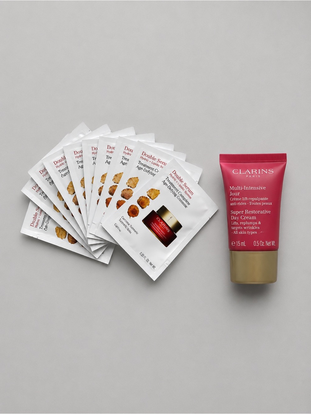 Clarins bundle with 15ml rose radiance cream and 10 sachets of moisturizer